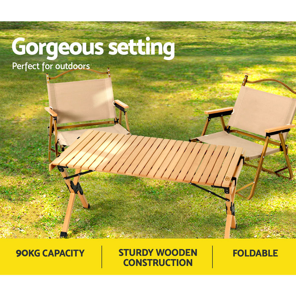 Gardeon Outdoor Furniture Wooden Egg Roll Picnic Table set up in a natural outdoor setting, showcasing its beech wood finish and lightweight design.