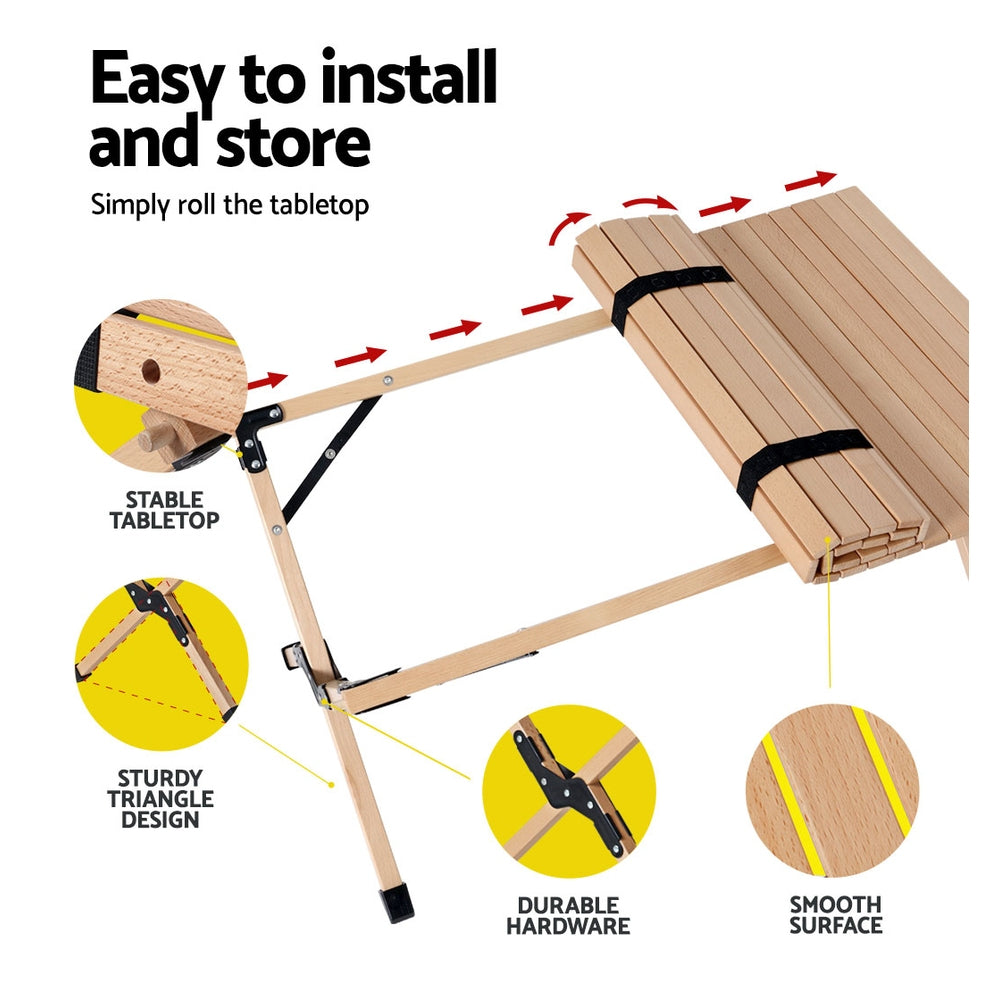 Gardeon Outdoor Furniture Wooden Egg Roll Picnic Table set up in a natural outdoor setting, showcasing its beech wood finish and lightweight design.