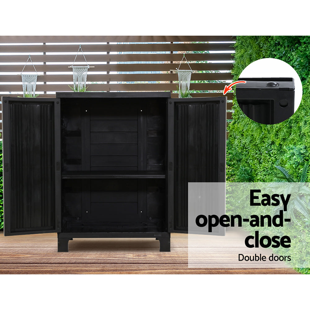 Gardeon Outdoor Storage Cabinet in a garden setting, showcasing its stylish design and lockable doors.