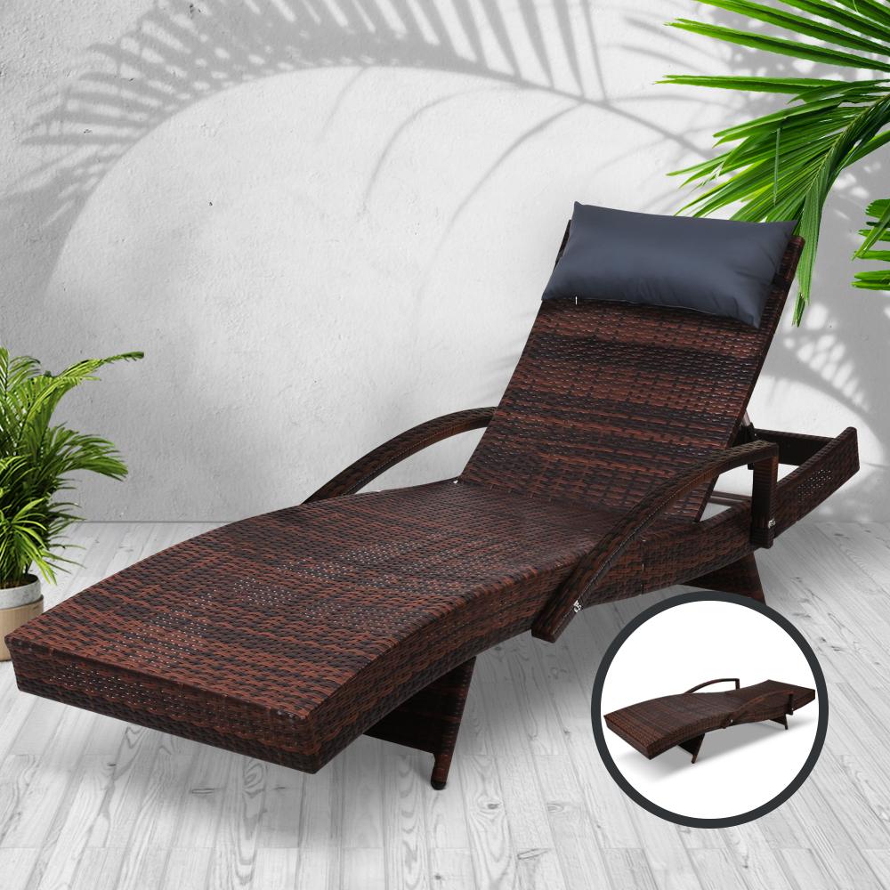 Gardeon Outdoor Sun Lounge Furniture Day Bed in brown wicker with adjustable armrests and black all-weather pillow, perfect for outdoor relaxation.