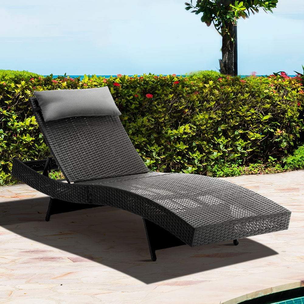 Gardeon Outdoor Wicker Sun Lounge in Black with lavender grey pillow, showcasing its elegant design and adjustable features.