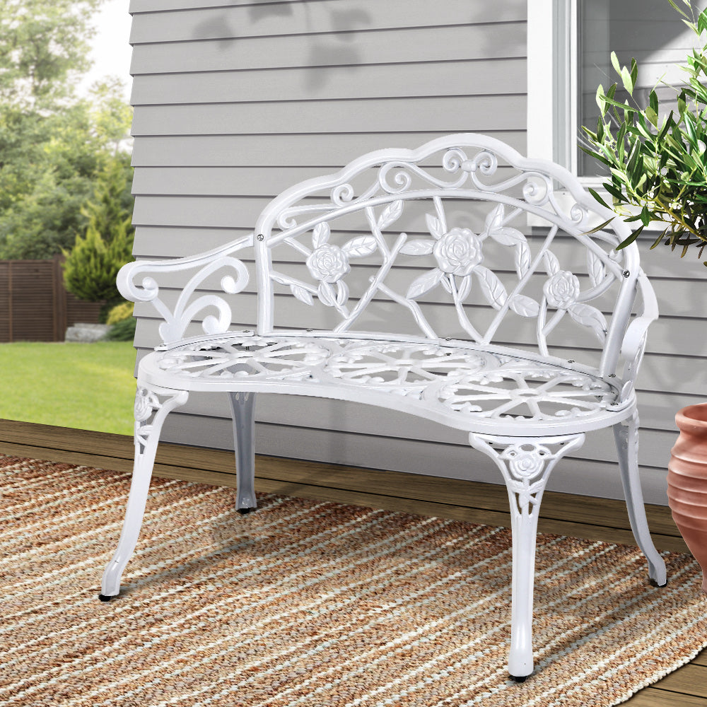 Gardeon Victorian Garden Bench in white with floral-patterned backrest and sturdy cast iron legs, perfect for outdoor settings.