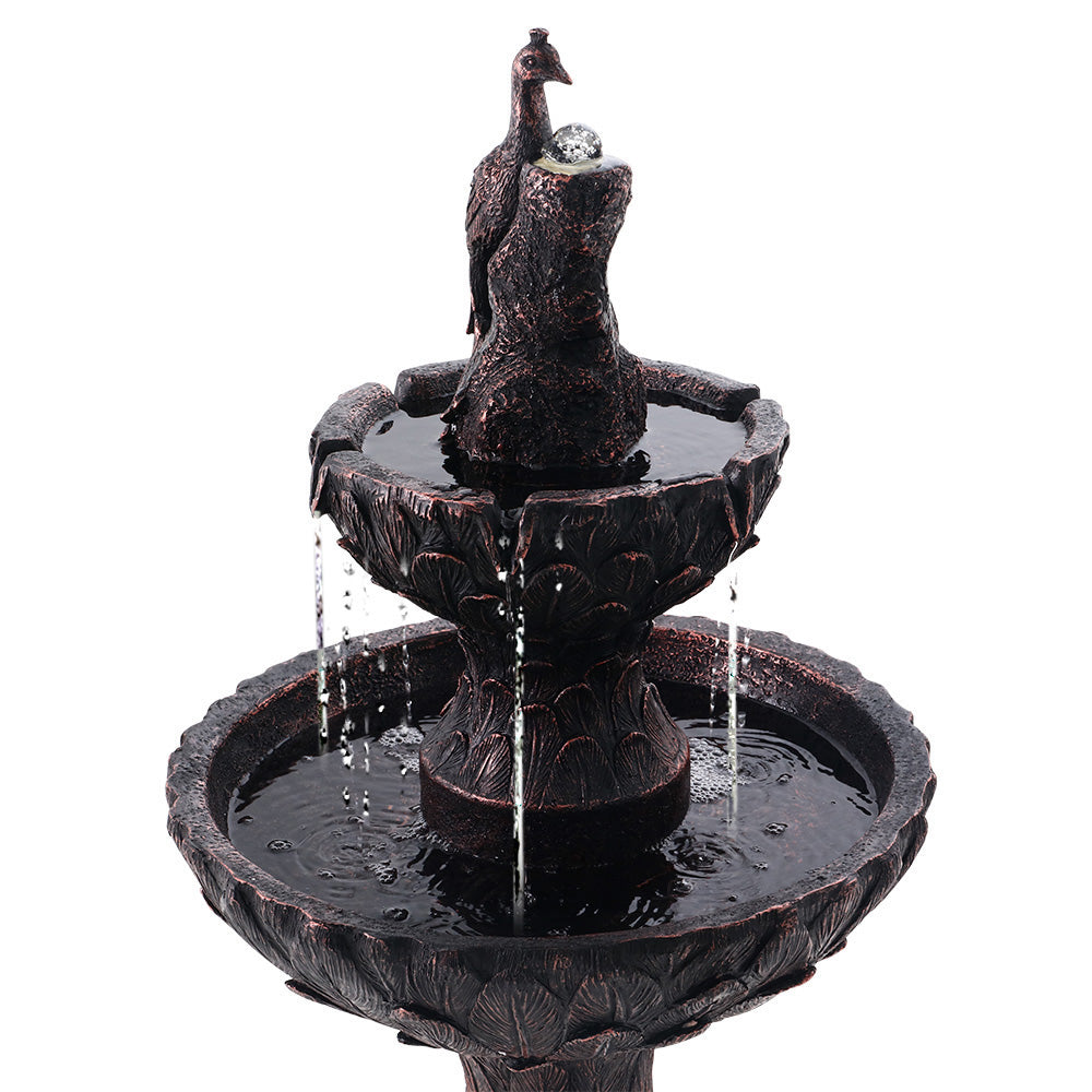 Gardeon Water Solar Fountain featuring a 3-tier bird bath with cascading waterfall, elegantly designed in brown polyresin for outdoor use.