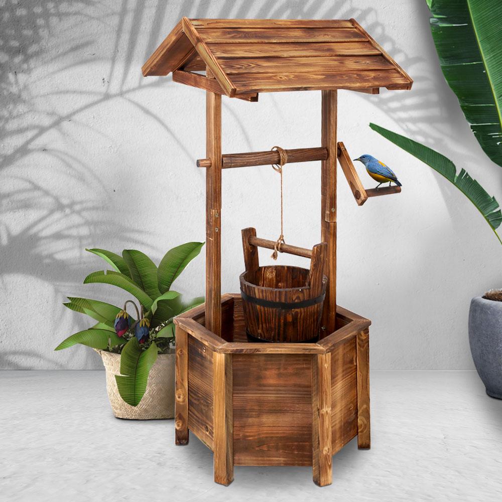 Gardeon Wooden Wishing Well made of solid fir wood, featuring a rustic design with a bucket and decorative roof, perfect for garden decor.