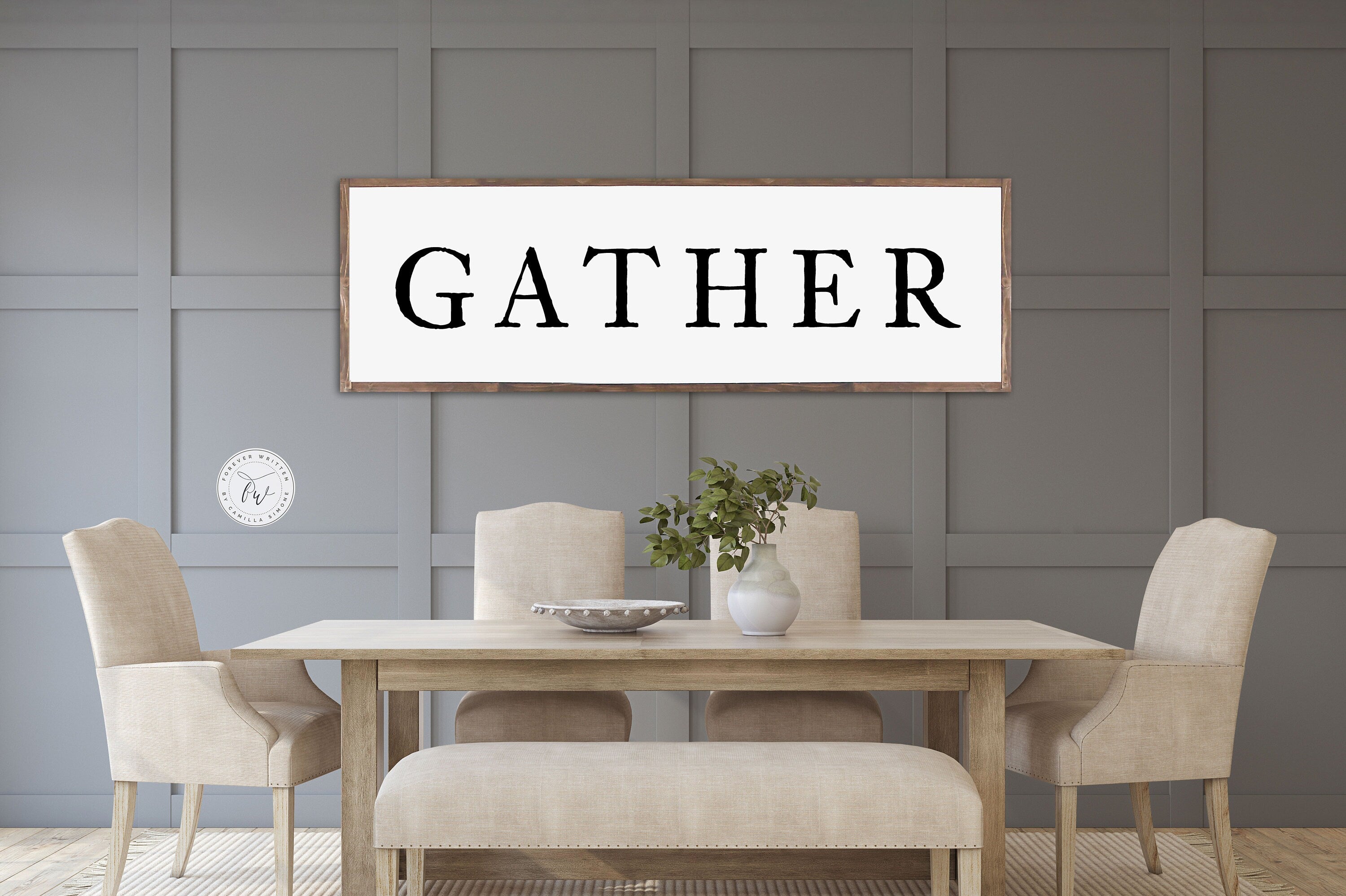 Gather Farmhouse Wood Sign featuring rustic wood grain and painted lettering, perfect for dining room decor.