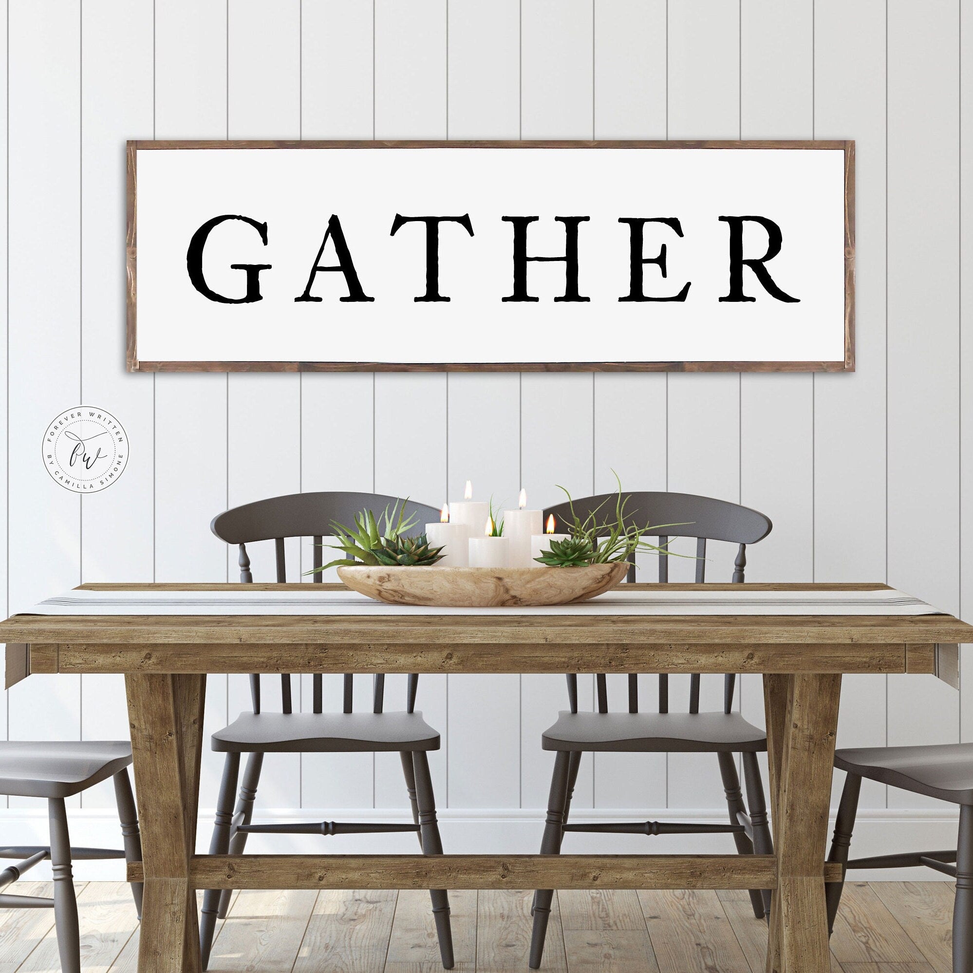 Gather Farmhouse Wood Sign featuring rustic wood grain and painted lettering, perfect for dining room decor.