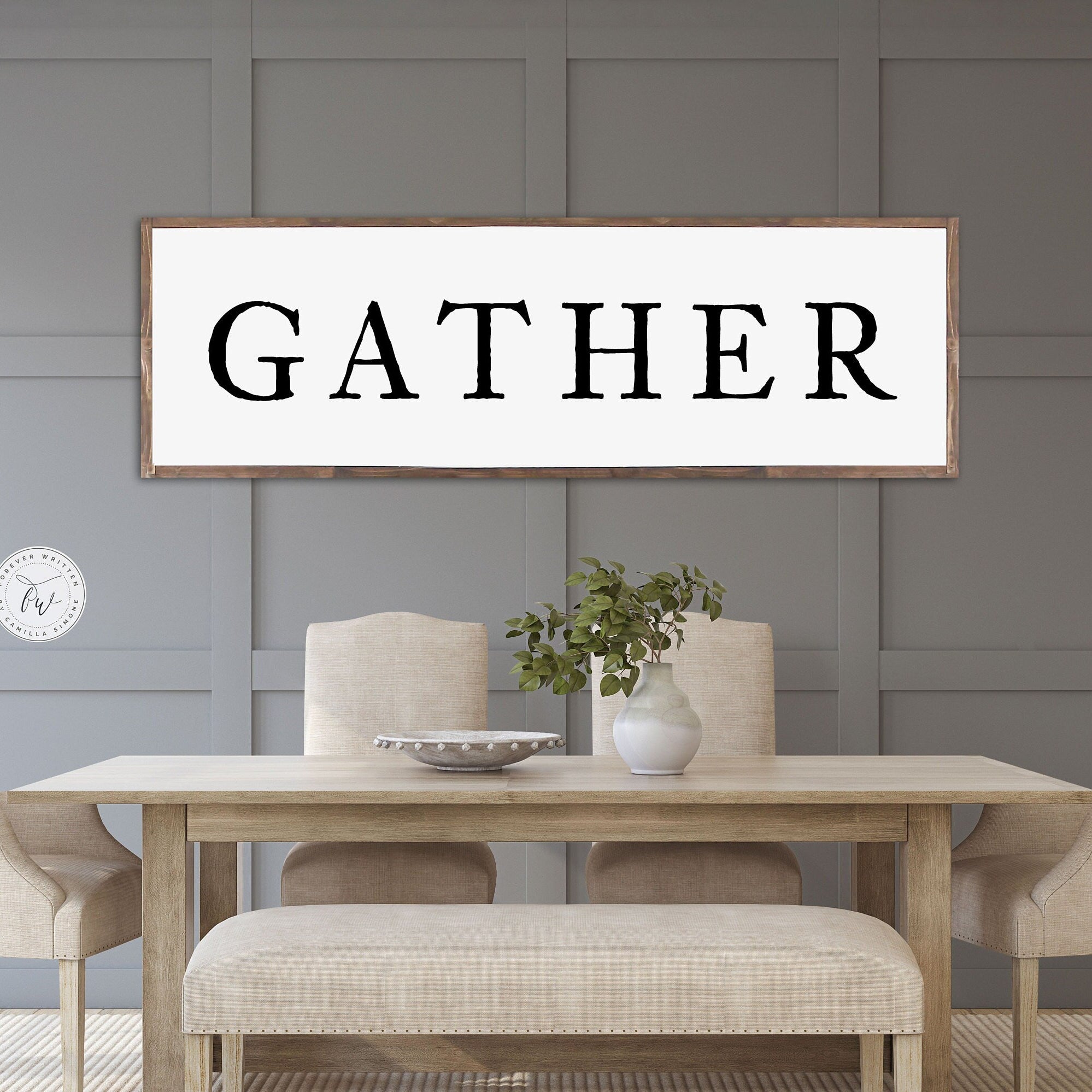 Gather Farmhouse Wood Sign featuring rustic wood grain and painted lettering, perfect for dining room decor.