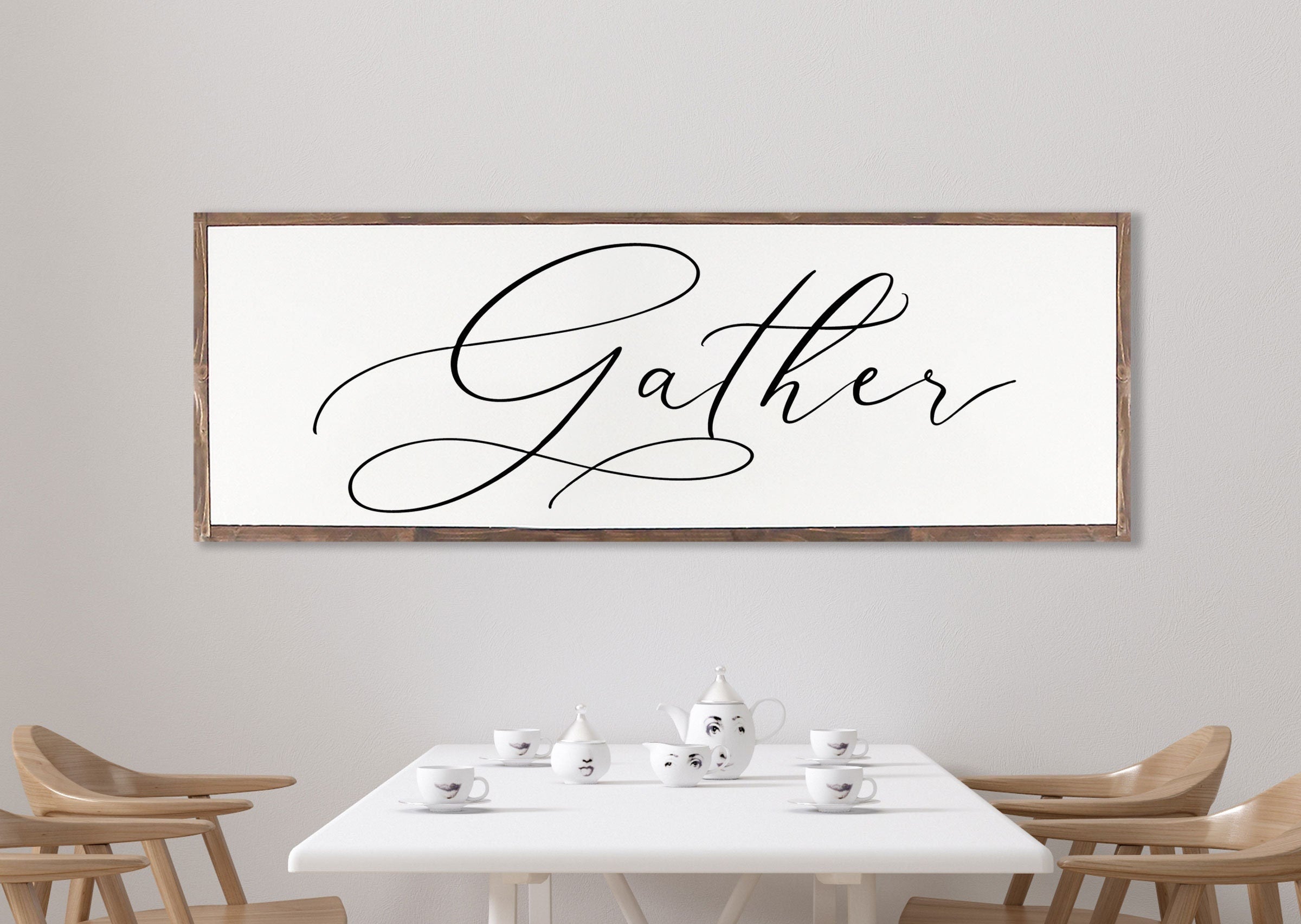 Gather Sign featuring a rustic wood design with the quote 'Bless the food before us' framed in a customizable color.