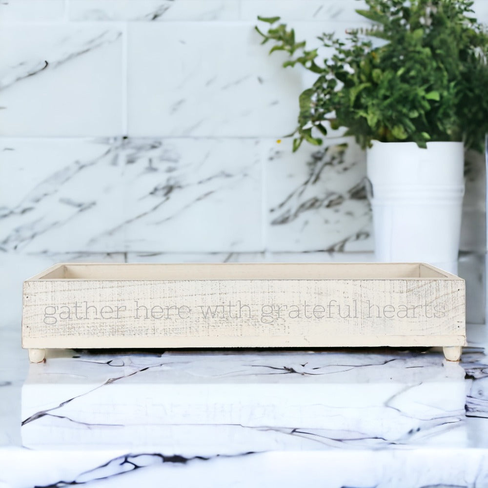 Handmade Gather Tray with the inscription 'Gather Here With Grateful Hearts', featuring round peg feet for elevation.