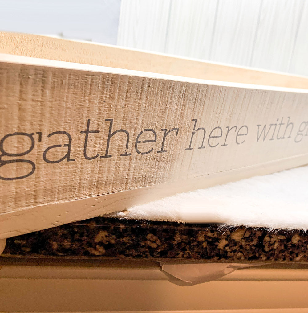 Handmade Gather Tray with the inscription 'Gather Here With Grateful Hearts', featuring round peg feet for elevation.