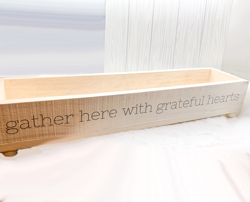 Handmade Gather Tray with the inscription 'Gather Here With Grateful Hearts', featuring round peg feet for elevation.