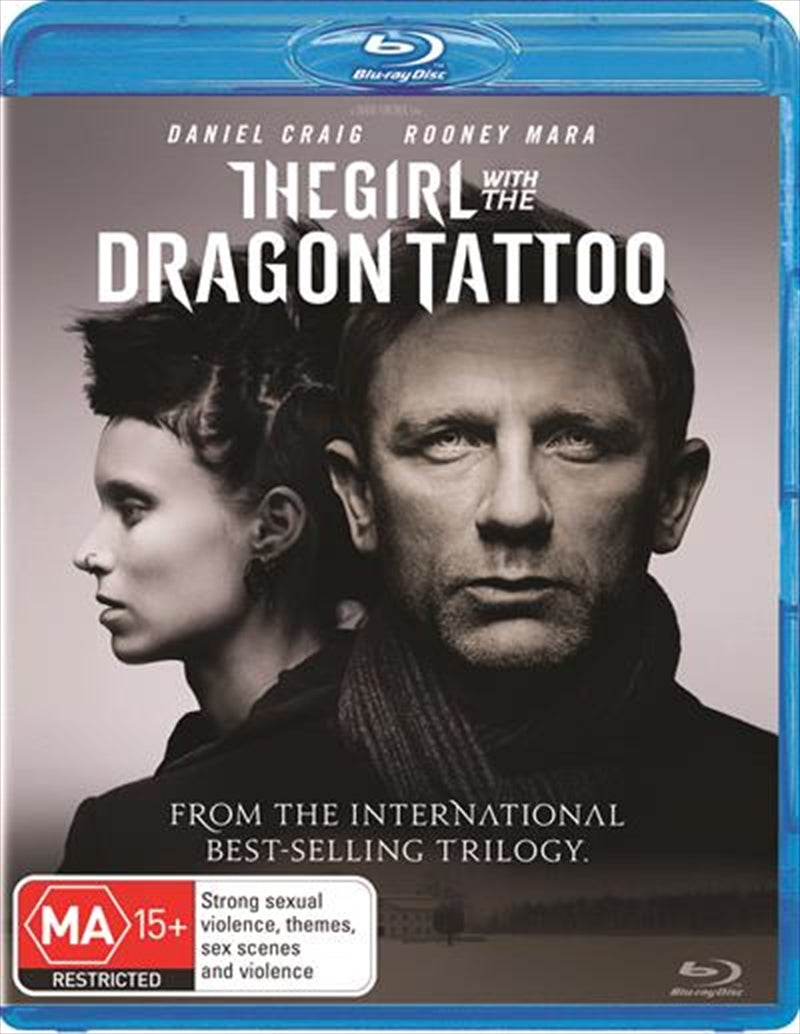 Blu-ray cover of 'Girl With The Dragon Tattoo' featuring Daniel Craig and Rooney Mara, showcasing a dark and mysterious aesthetic.