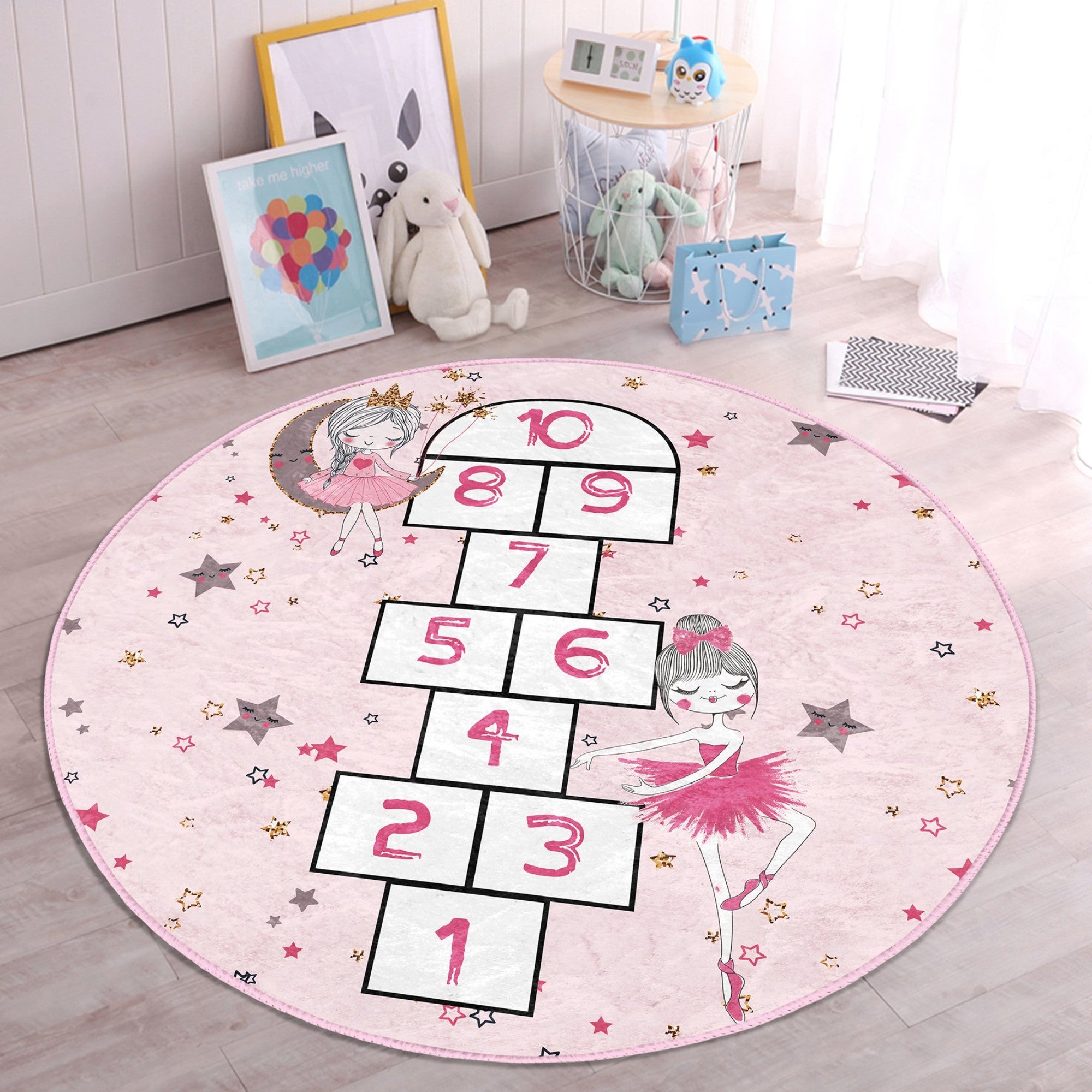 Girls Room Pink Hopscotch Washable Round Rug featuring a vibrant hopscotch design, soft texture, and round shape, perfect for children's play areas.