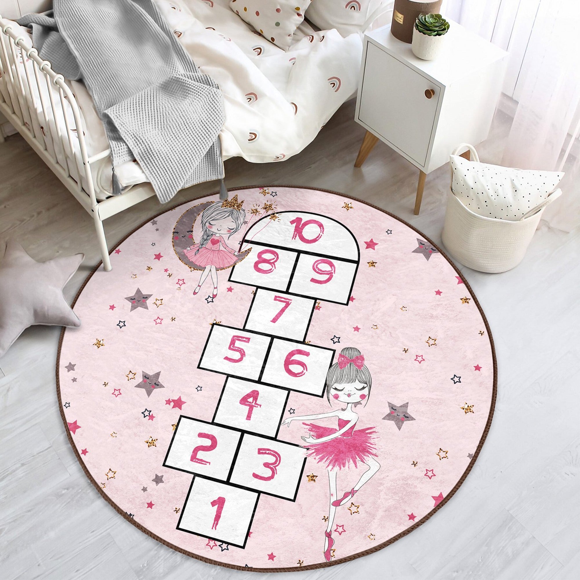 Girls Room Pink Hopscotch Washable Round Rug featuring a vibrant hopscotch design, soft texture, and round shape, perfect for children's play areas.