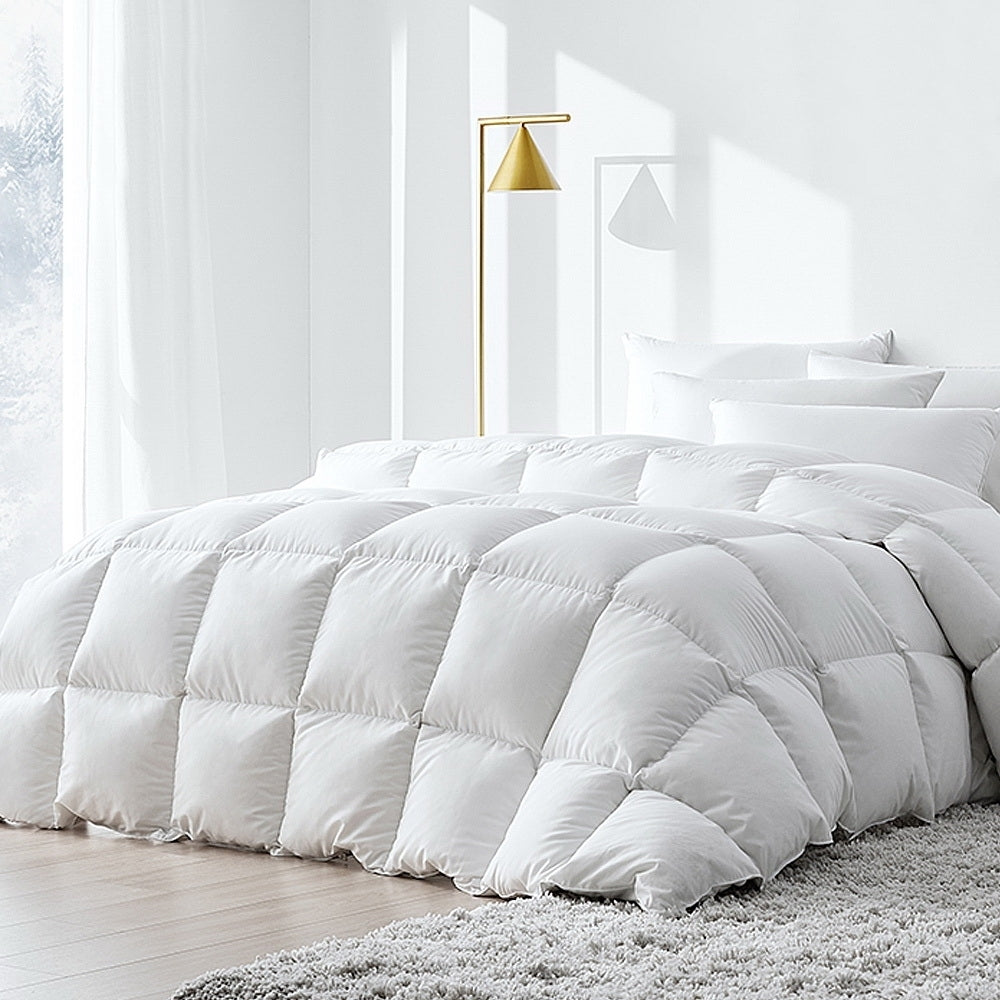 Giselle Bedding Duck Down Feather Quilt in white, showcasing its soft cotton cover and fluffy filling, perfect for winter warmth.