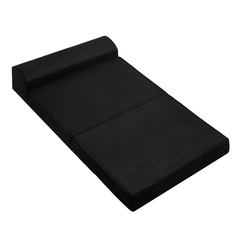 Giselle Bedding Folding Foam Mattress in black, showcasing its dual functionality as a sofa and bed, with a removable cover.