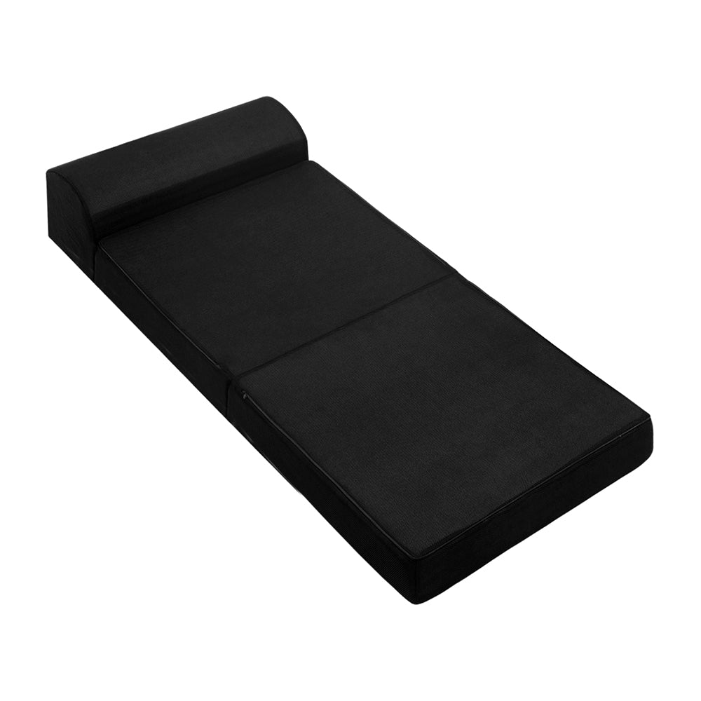 Giselle Bedding Folding Foam Mattress in black, showcasing its foldable design and breathable fabric.