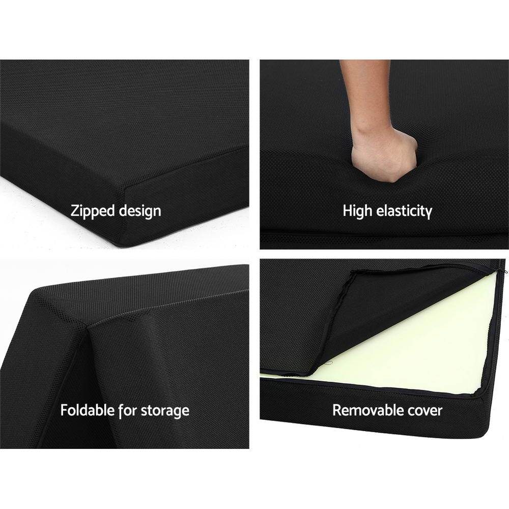 Giselle Bedding Folding Foam Mattress in black, showcasing its dual functionality as a sofa and bed, with a removable cover.