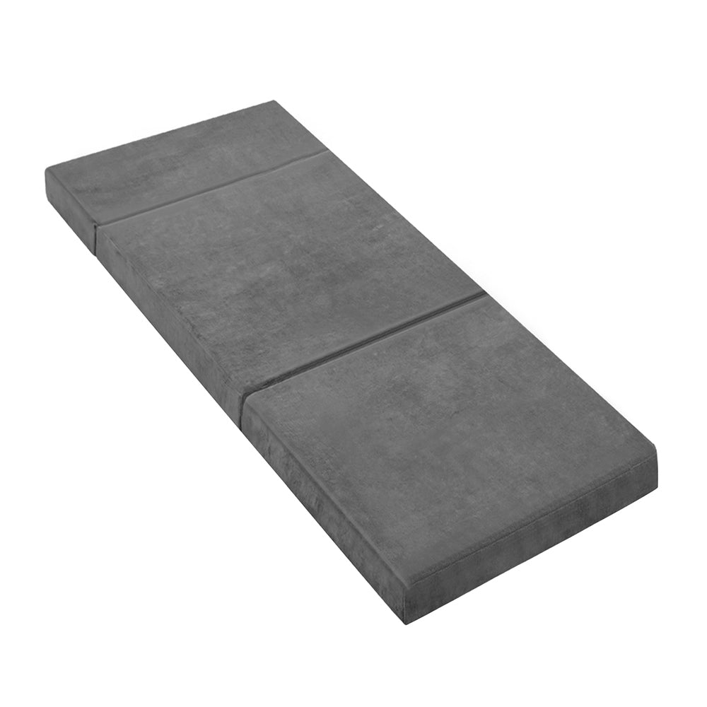 Giselle Bedding Folding Foam Portable Mattress in Grey, showcasing its plush velvet fabric and foldable design.