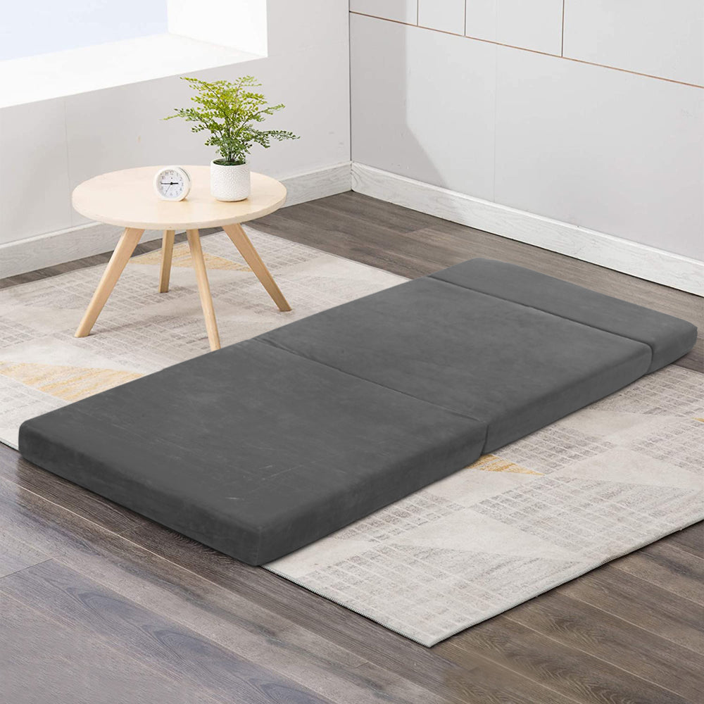 Giselle Bedding Folding Foam Portable Mattress in Grey, showcasing its plush velvet fabric and foldable design.