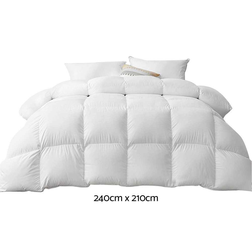 Giselle Bedding King Size 800GSM Goose Down Feather Quilt displayed on a bed, showcasing its luxurious white cotton cover and plush filling.