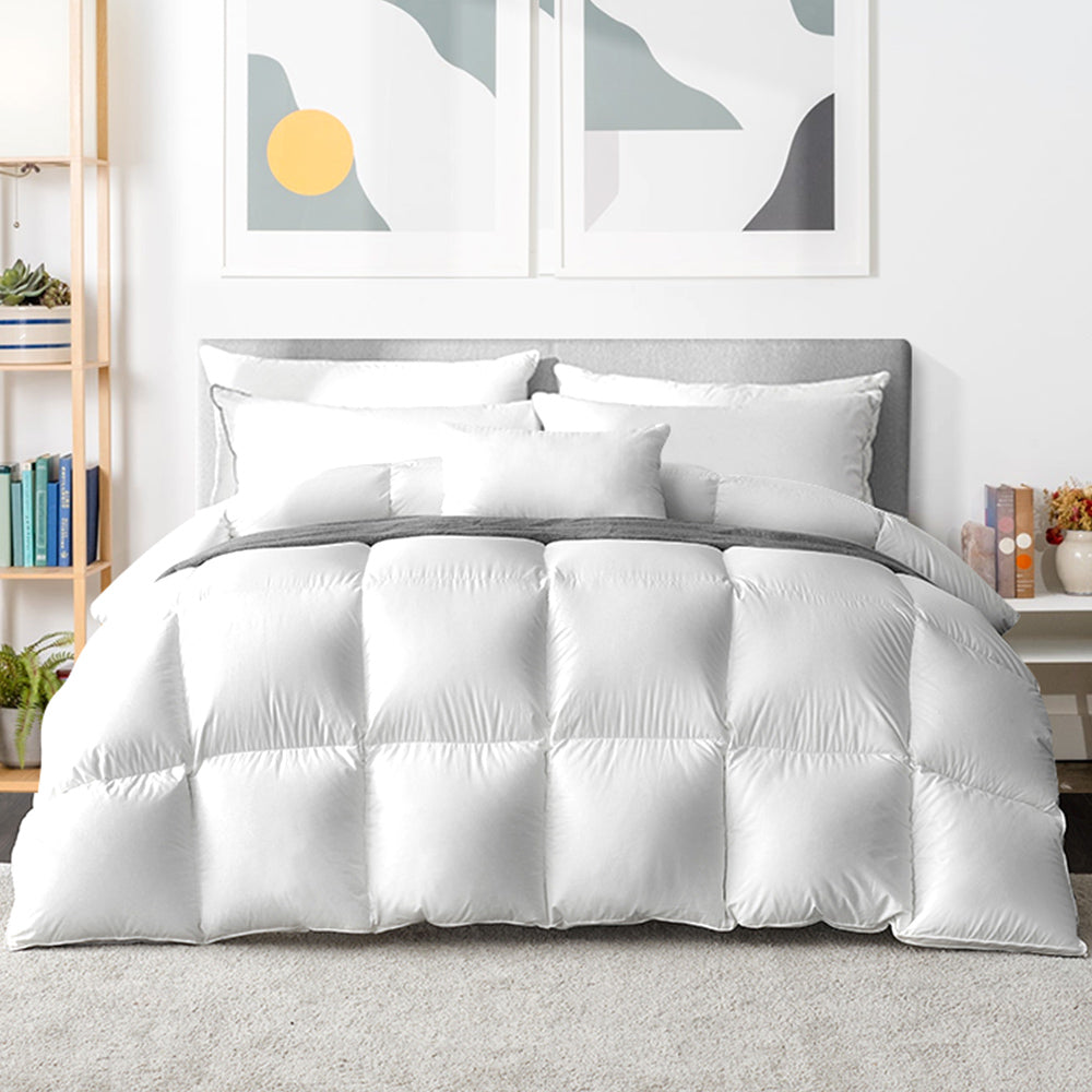 Giselle Bedding King Size 800GSM Goose Down Feather Quilt displayed on a bed, showcasing its luxurious white cotton cover and plush filling.