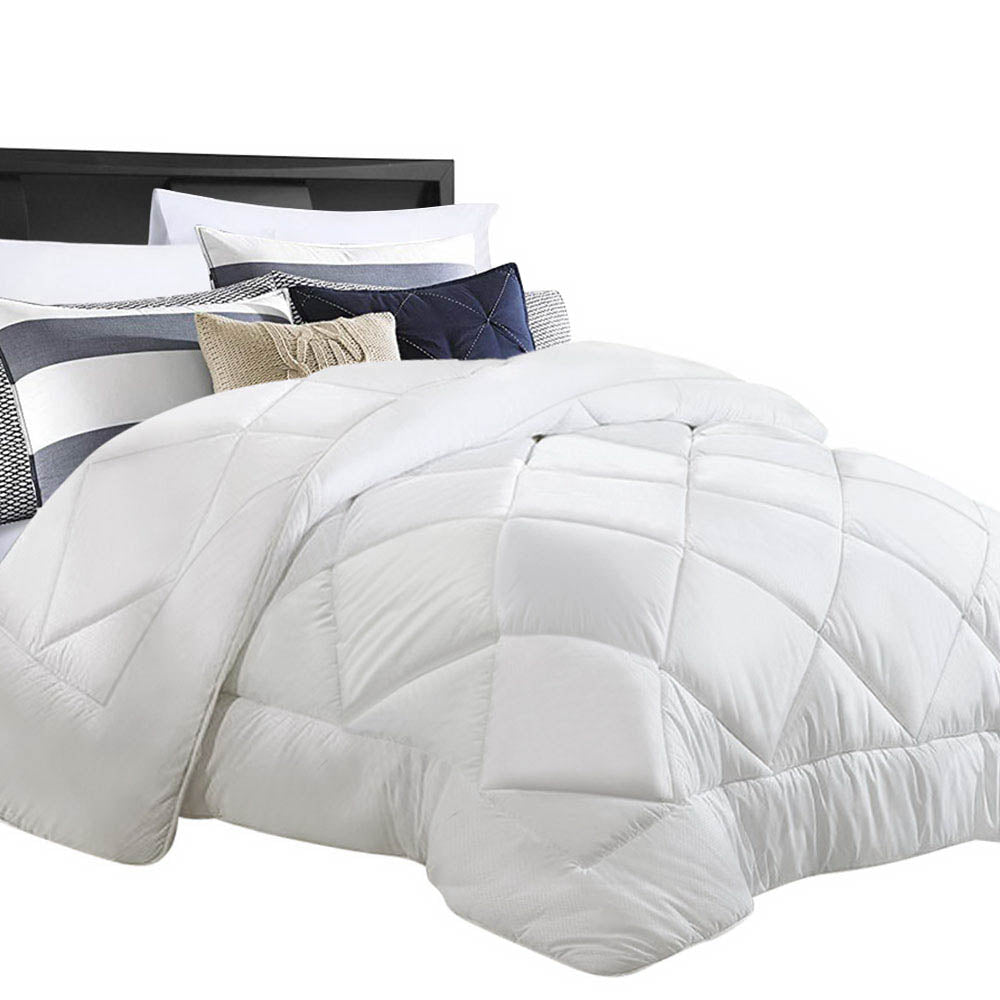 Giselle Bedding Super King 800GSM Microfibre Bamboo Quilt displayed on a bed, showcasing its luxurious white microfibre cover and diamond-stitch design.