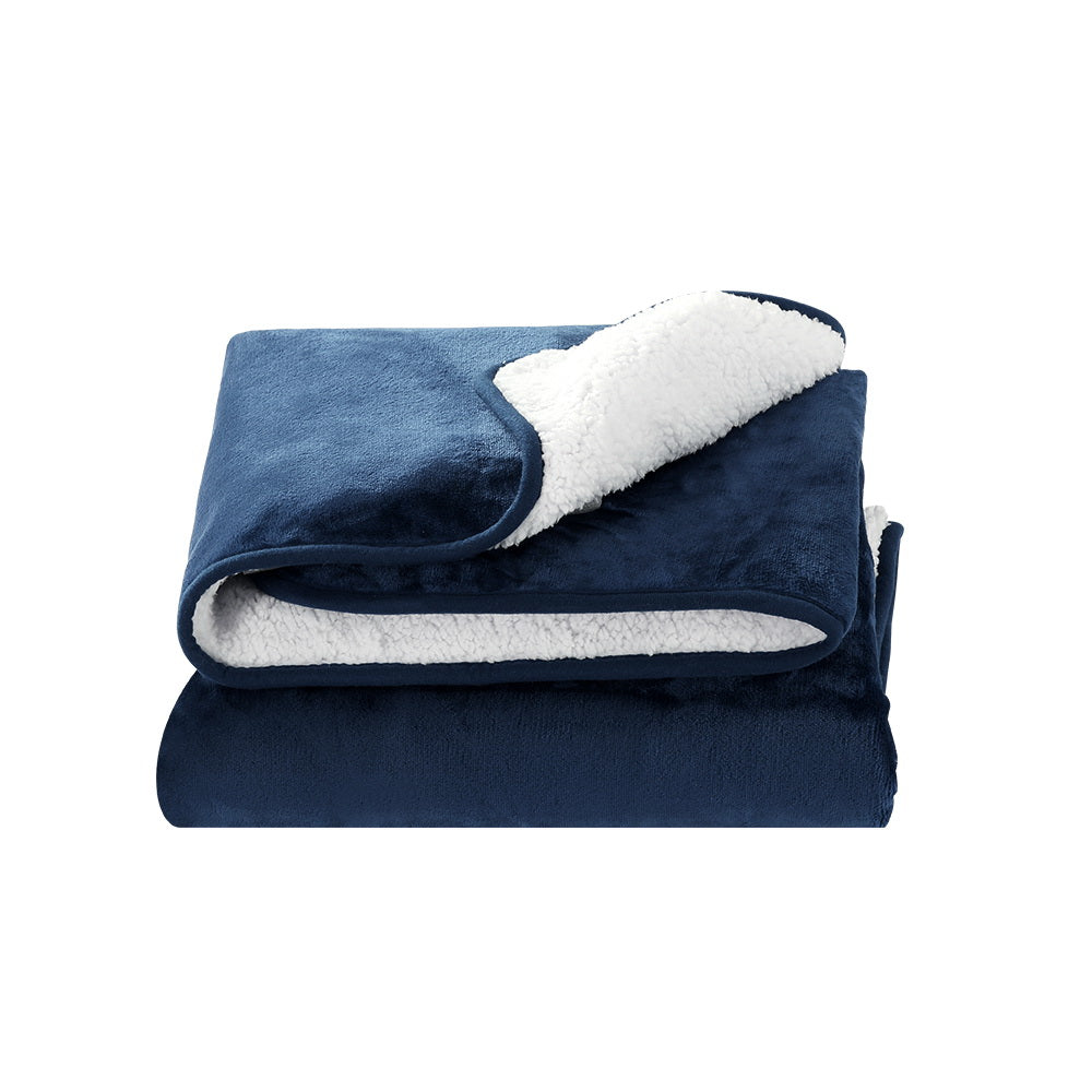 Giselle Electric Throw Rug in navy blue, showcasing premium flannel and sherpa fabric with a detachable controller.