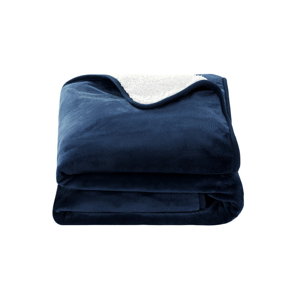 Giselle Electric Throw Rug in navy blue, showcasing premium flannel and sherpa fabric with a detachable controller.