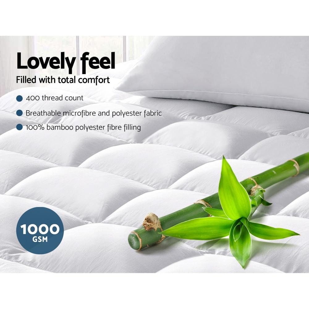 Giselle King Mattress Topper featuring bamboo fibre filling and elastic skirt for a secure fit.