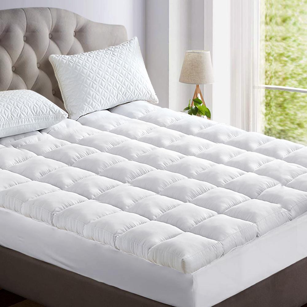 Giselle King Mattress Topper featuring bamboo fibre filling and elastic skirt for a secure fit.