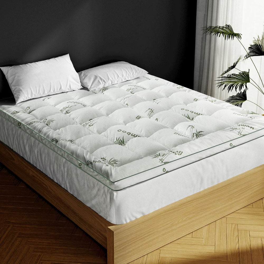 Giselle Pillowtop Mattress Topper featuring bamboo fabric and plush filling, designed for comfort and support.