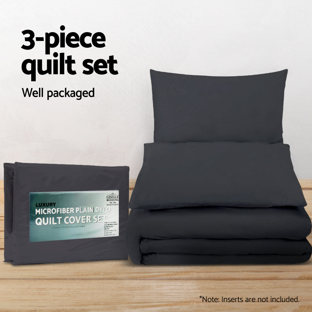 Giselle Quilt Cover Set in classic black, featuring pinch pleated design, includes two pillowcases and a quilt cover for queen beds.