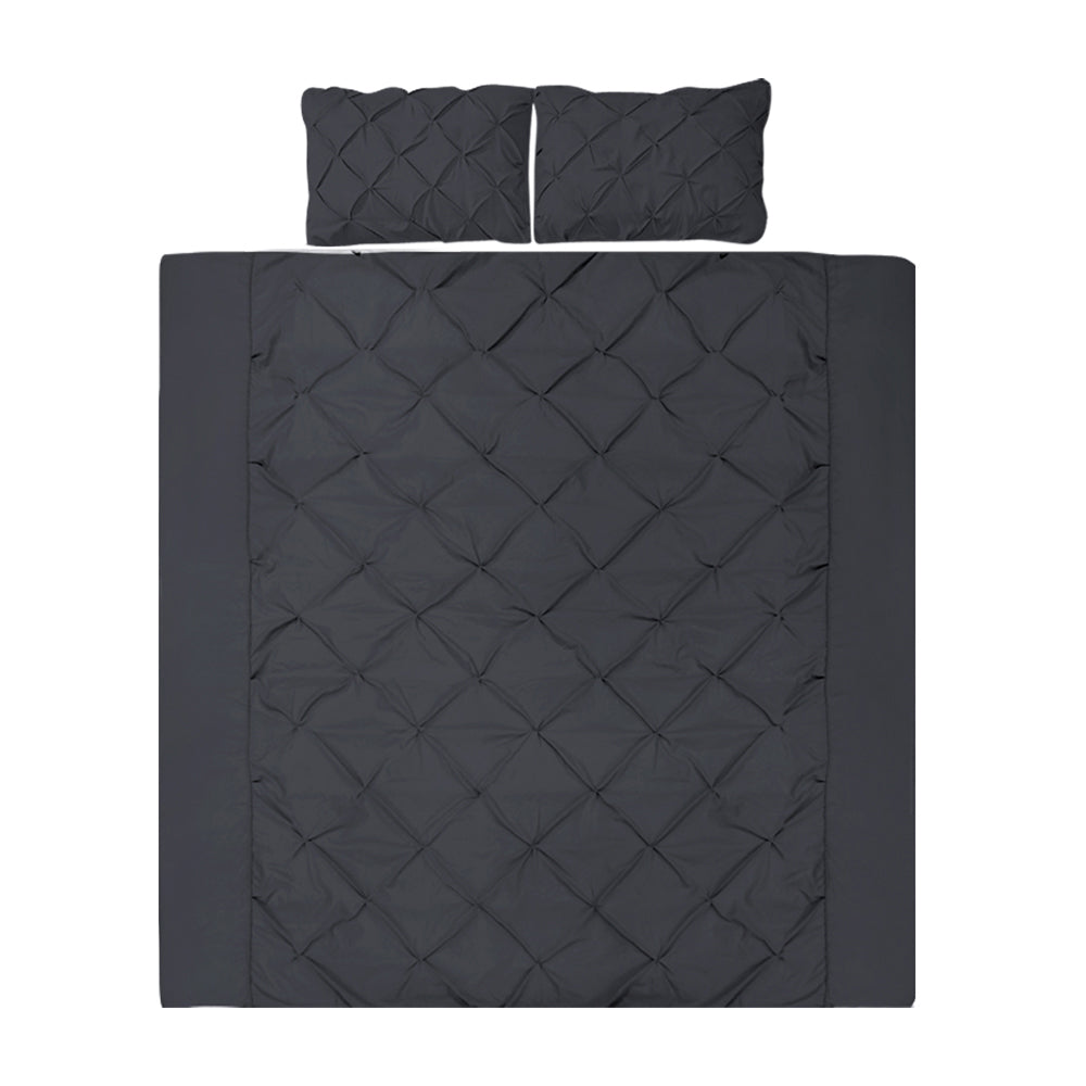 Giselle Quilt Cover Set in Diamond Pinch Black, featuring elegant pinch pleats and soft microfibre material, perfect for a stylish bedroom.