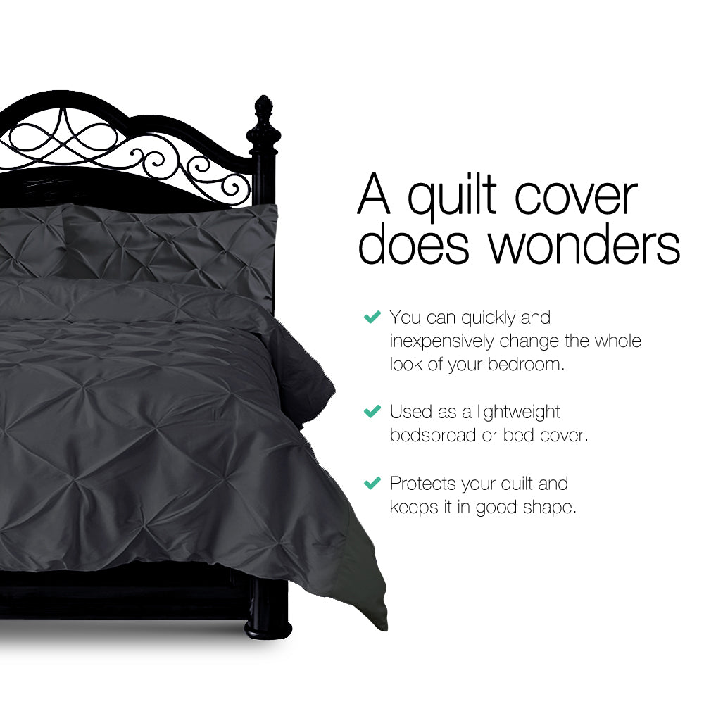 Giselle Quilt Cover Set in Diamond Pinch Black, featuring elegant pinch pleats and soft microfibre material, perfect for a stylish bedroom.