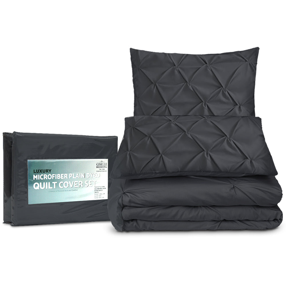 Giselle Quilt Cover Set in Diamond Pinch Black, featuring elegant pinch pleats and soft microfibre material, perfect for a stylish bedroom.