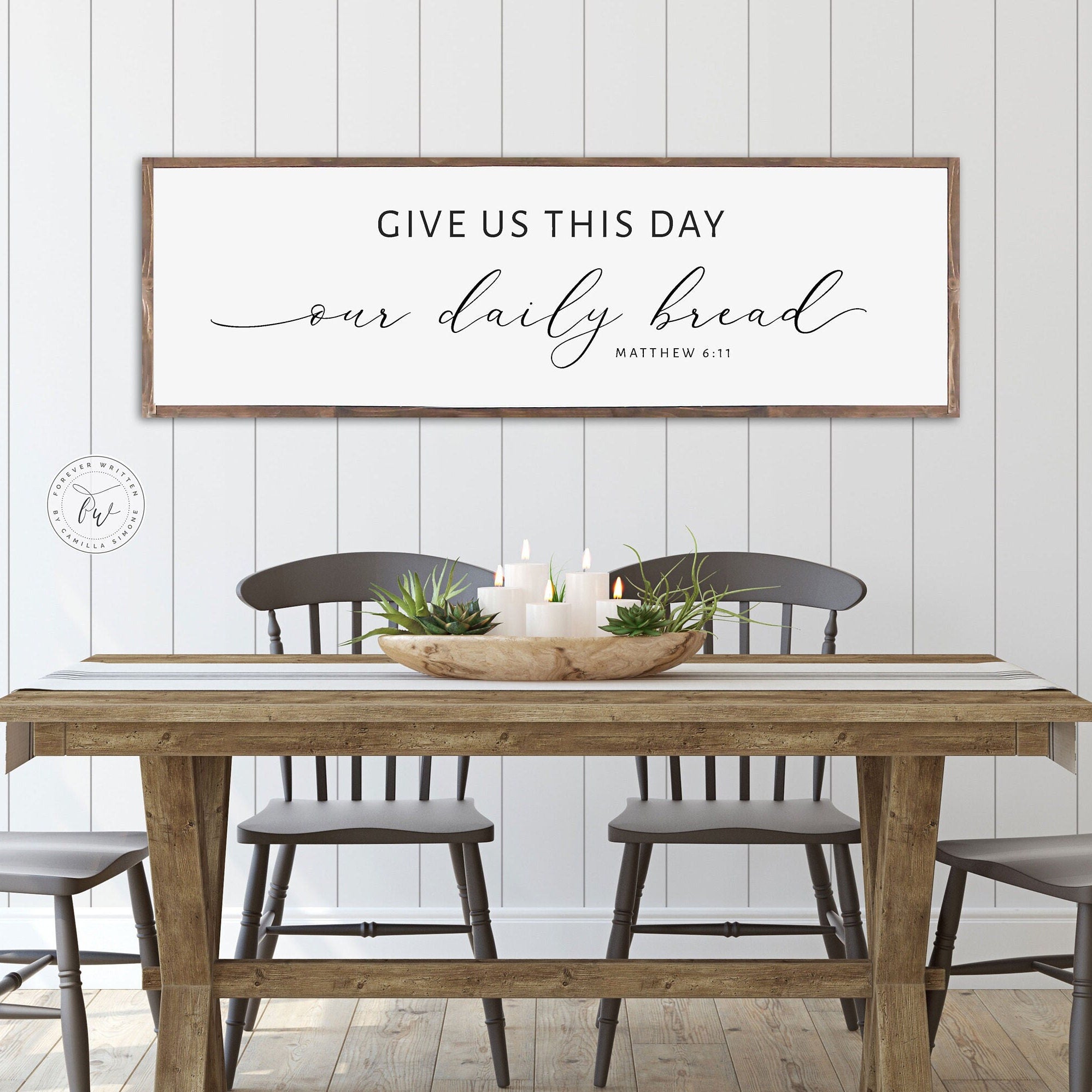 Rustic handmade wood sign featuring the verse 'Give Us This Day Our Daily Bread' from Matthew 6:11, framed and stained in customizable colors.