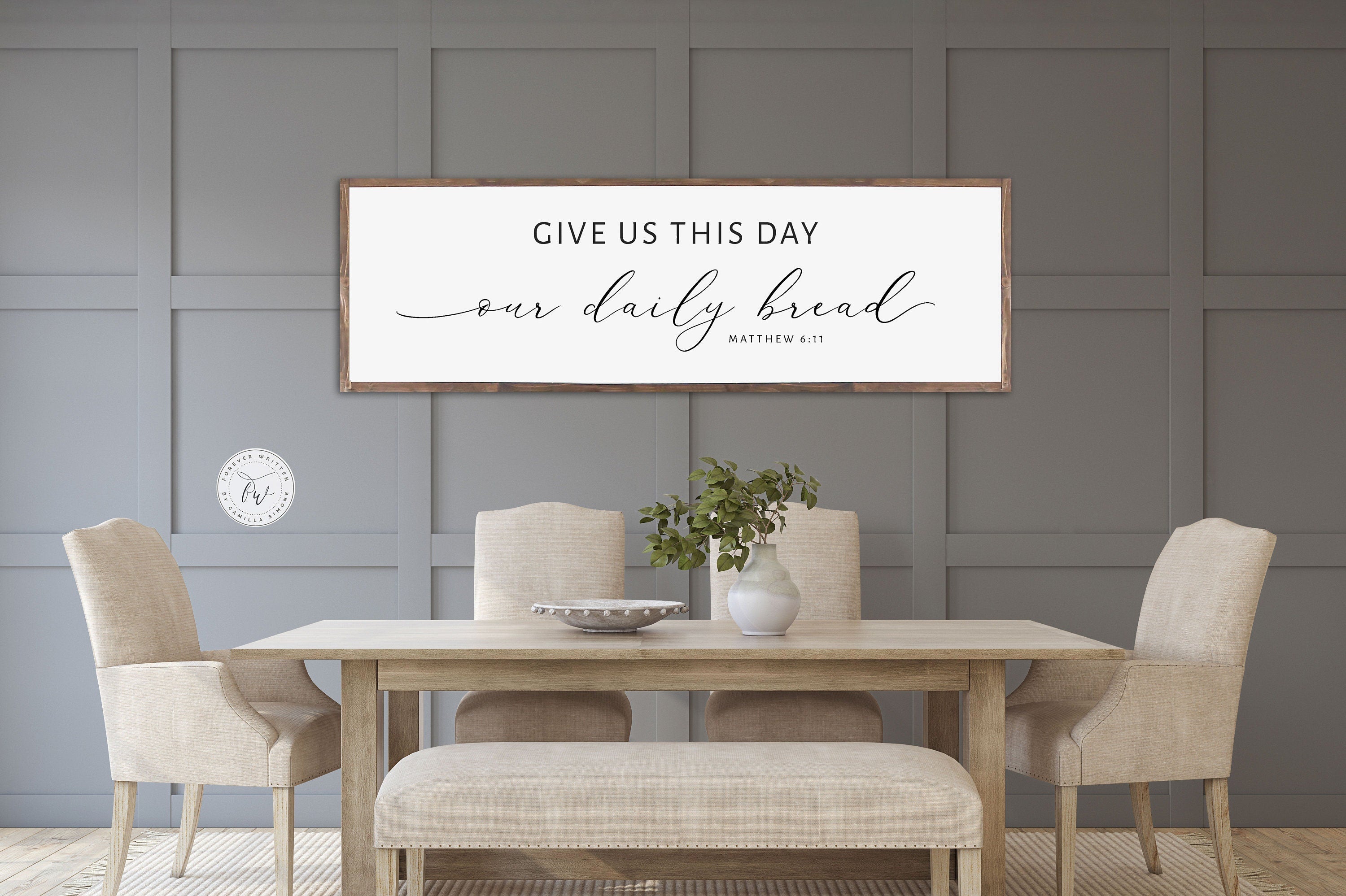 Rustic handmade wood sign featuring the verse 'Give Us This Day Our Daily Bread' from Matthew 6:11, framed and stained in customizable colors.