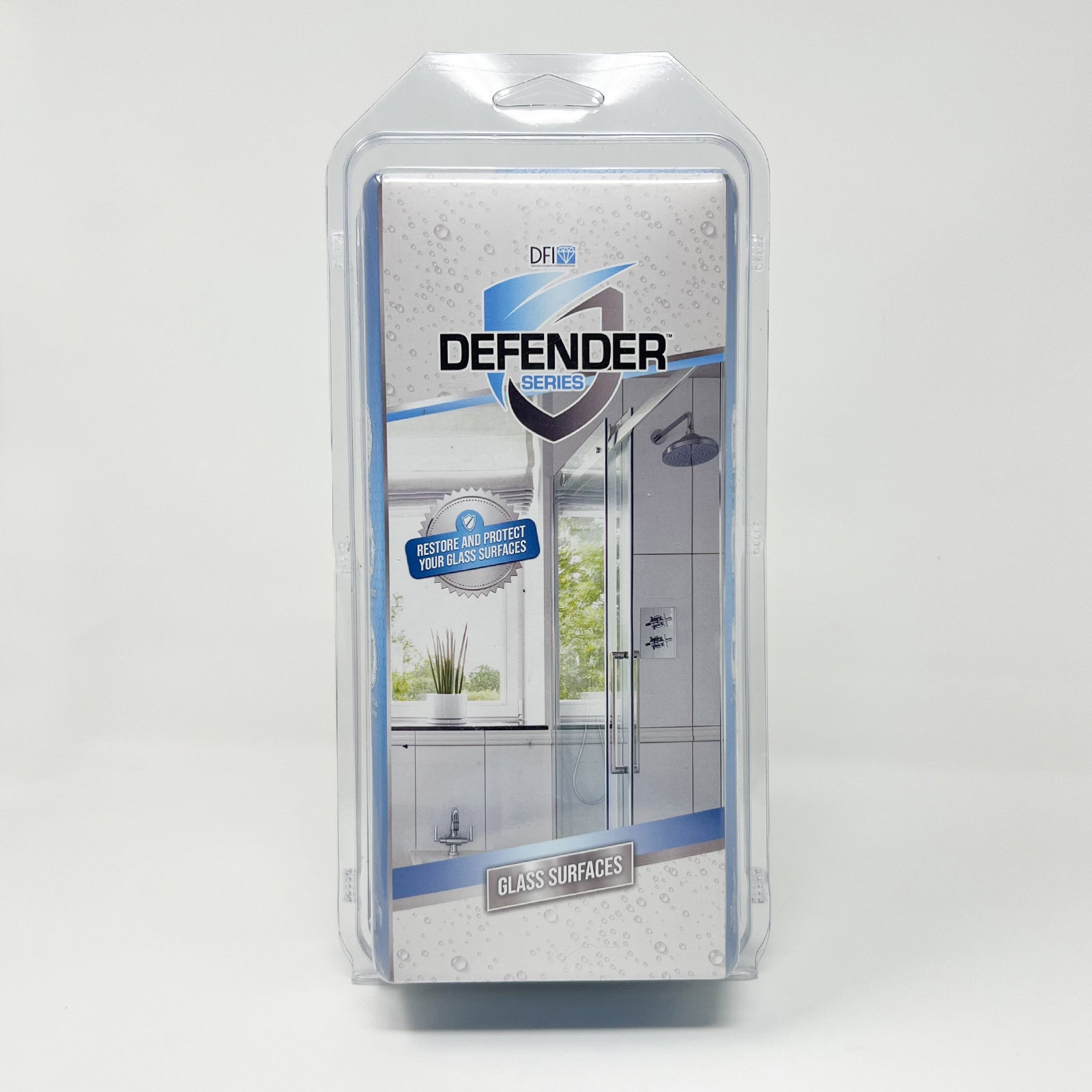 Glass Defender™ Kit including Restoration Powder, Scrubber Pad, Clear-Fusion™ V Bottle, and Microfiber Towel for glass treatment.