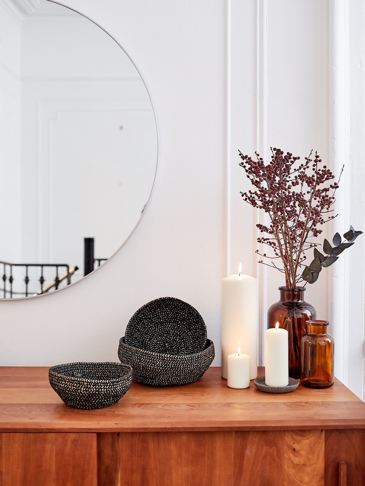 Set of two handcrafted black and gold glitter bowls made from braided jute and golden yarn, perfect for stylish storage.