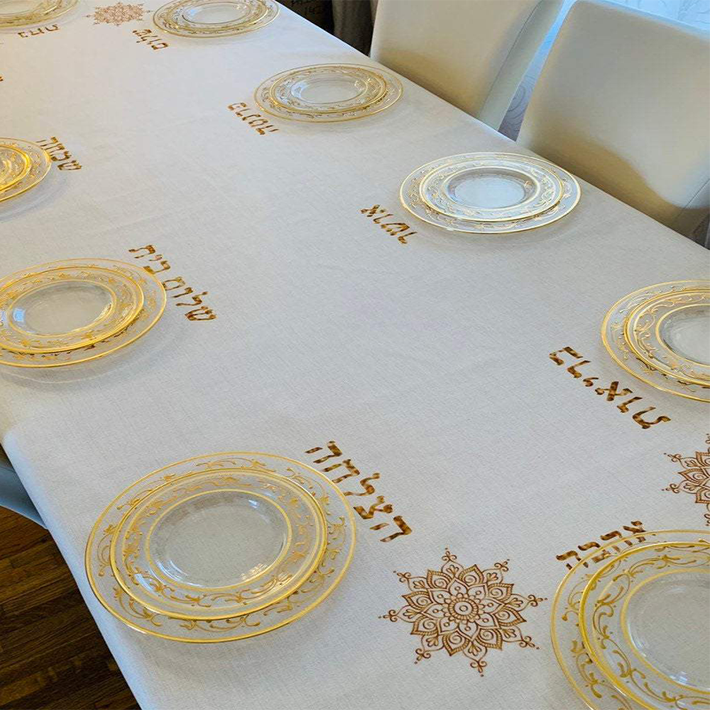 Gold Brachot tablecloth featuring embroidered blessings, designed by Broderies de France, perfect for Shabbat and Yom Tov.