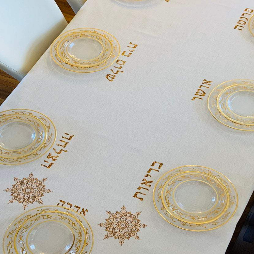 Gold Brachot tablecloth featuring embroidered blessings, designed by Broderies de France, perfect for Shabbat and Yom Tov.