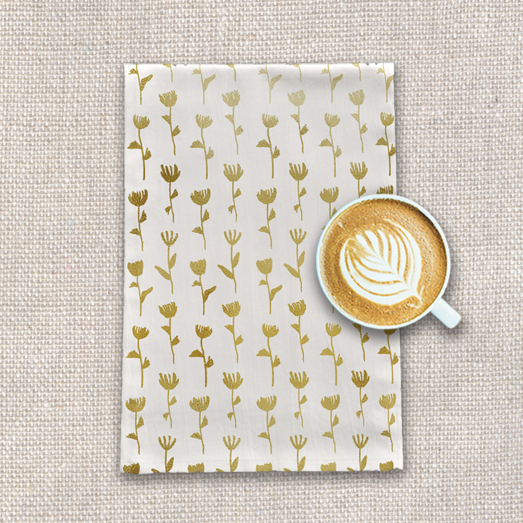 Gold Flower Tea Towel made of cotton twill, featuring a beautiful floral design, perfect for kitchen decor and practical use.