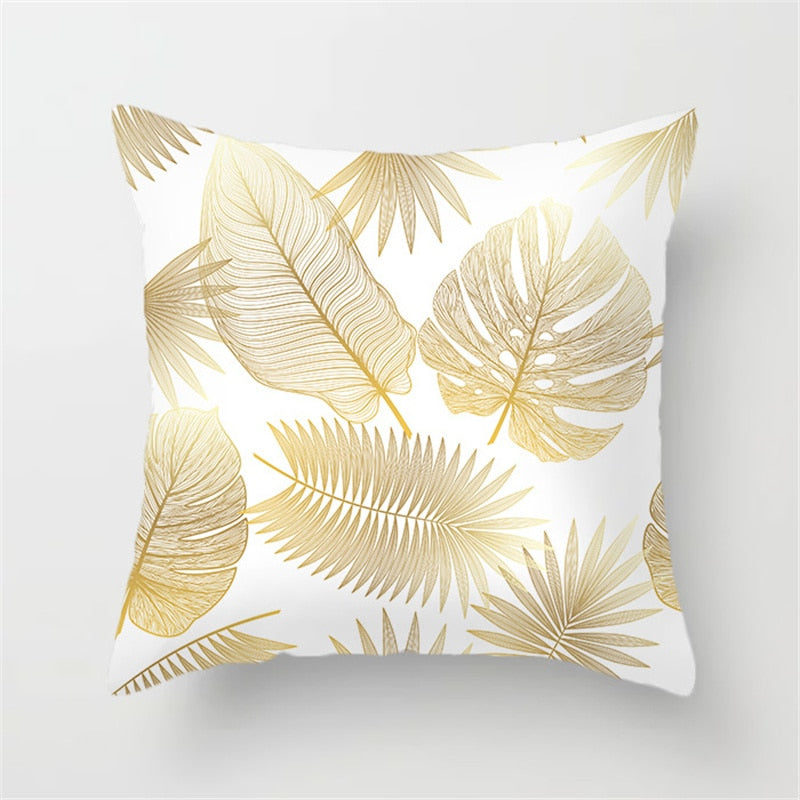 Gold Leaf Cushion Cover showcasing an elegant gold leaf pattern on a soft polyester fabric, perfect for home decor.