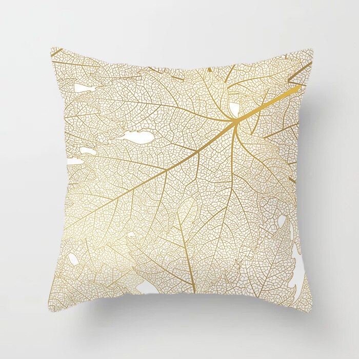 Gold Leaf Cushion Cover showcasing an elegant gold leaf pattern on a soft polyester fabric, perfect for home decor.