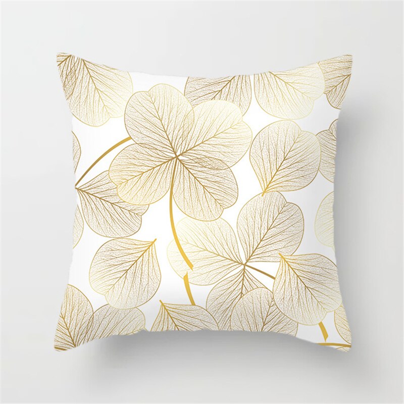 Gold Leaf Cushion Cover showcasing an elegant gold leaf pattern on a soft polyester fabric, perfect for home decor.