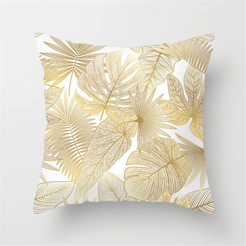 Gold Leaf Cushion Cover showcasing an elegant gold leaf pattern on a soft polyester fabric, perfect for home decor.