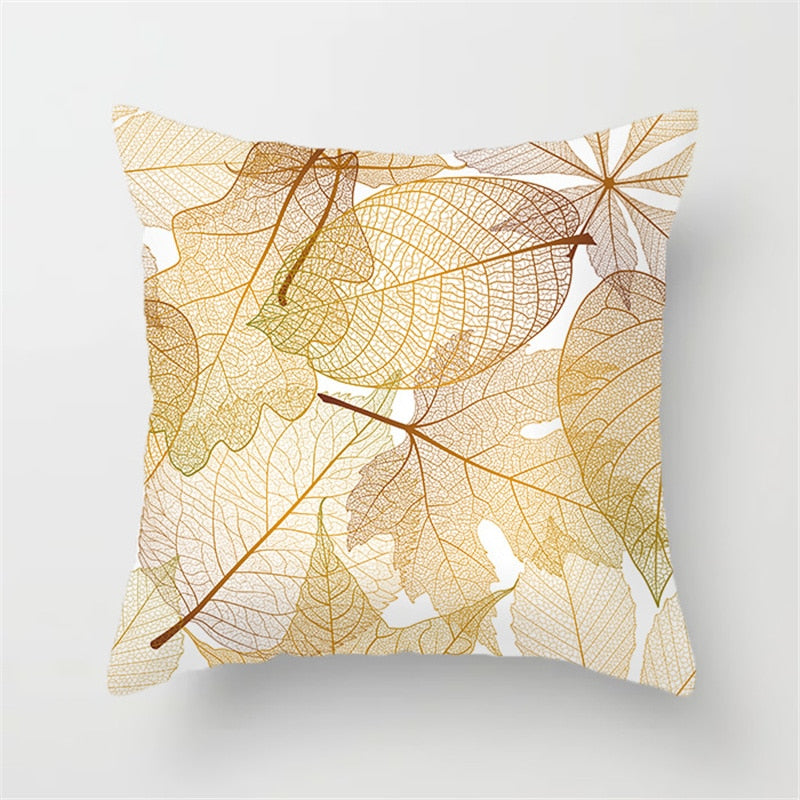 Gold Leaf Cushion Cover showcasing an elegant gold leaf pattern on a soft polyester fabric, perfect for home decor.