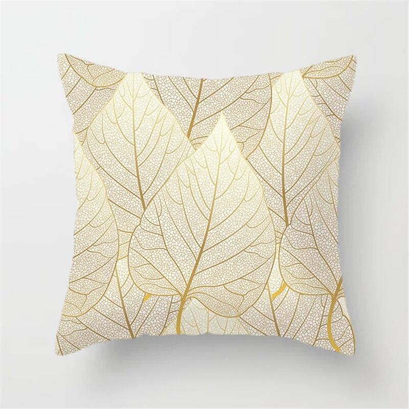 Gold Leaf Cushion Cover showcasing an elegant gold leaf pattern on a soft polyester fabric, perfect for home decor.