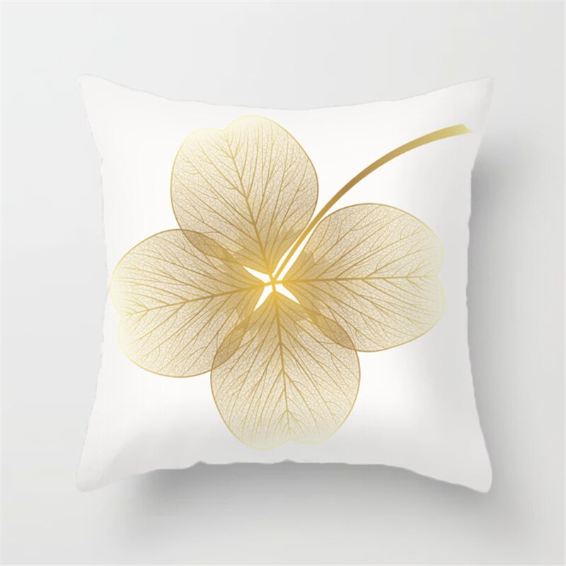 Gold Leaf Cushion Cover showcasing an elegant gold leaf pattern on a soft polyester fabric, perfect for home decor.